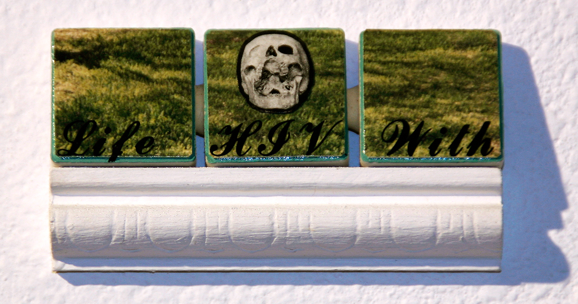 <br/>Day 54, 1998<br/>1" x 3"<br/>acrylic, photos, lettering, paper, ink and pencil on ceramic tiles